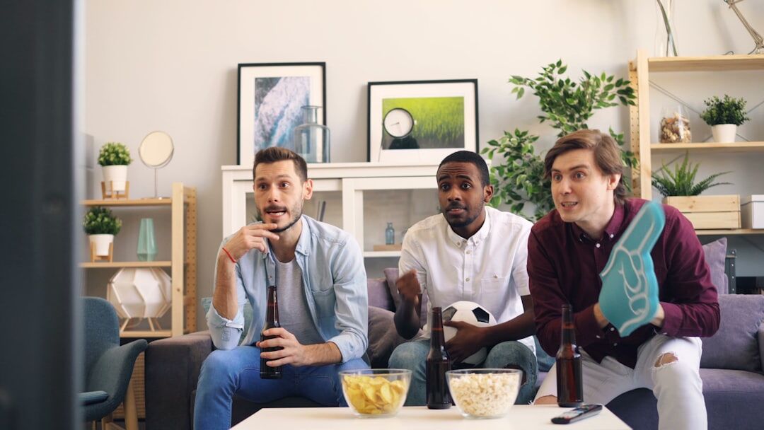 group watching tv